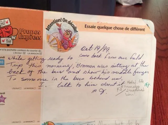 Handwritten note in a school agenda.