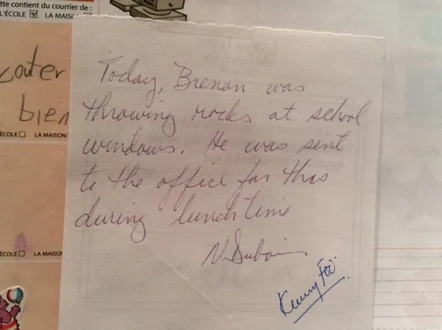 Handwritten note in a school agenda.